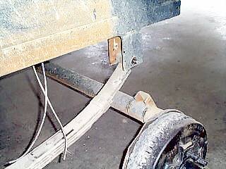 Axle rolled back under the spring